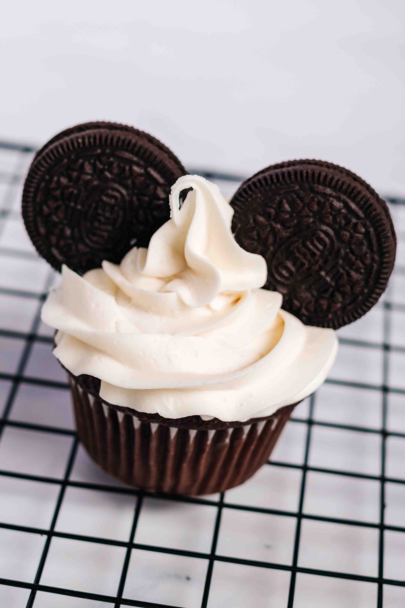 Super Easy Mickey Mouse Cupcakes featured by top US Disney blogger, Marcie and the Mouse.