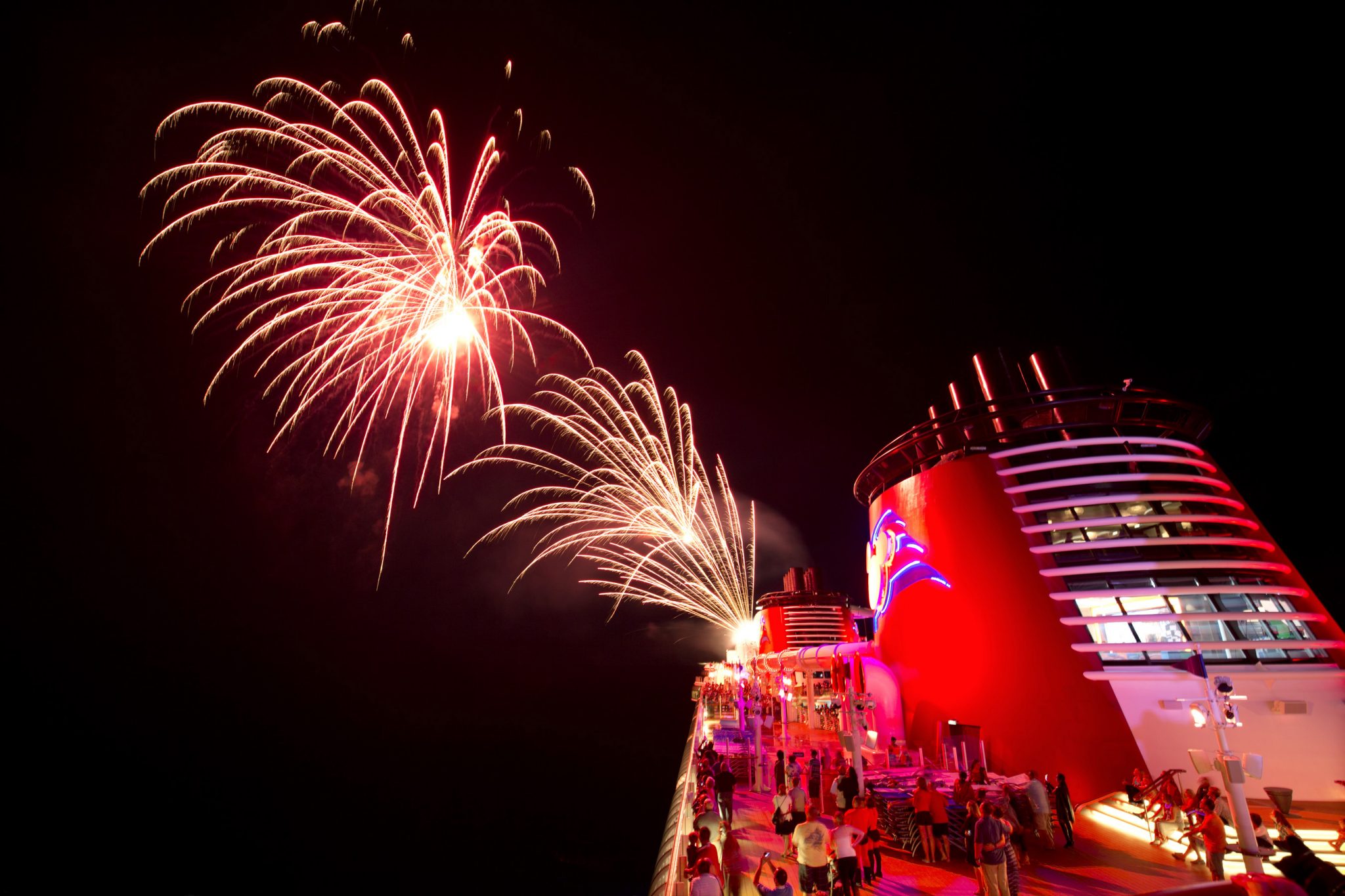 Top 10 Things to Do on Disney Fantasy featured by top US Disney blogger, Marcie and the Mouse: Disney Cruise Line lights up the sky to dazzle guests with the largest, awe-inspiring fireworks extravaganza presented aboard a cruise ship. The skies above the Disney Fantasy and the Disney Dream explode with brilliant colors during “Buccaneer Blast!” – a pyrotechnic spectacular choreographed to a dramatic score featuring songs from the “Pirates of the Caribbean” movies. (Gregg Newton, photographer)